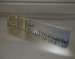 Personalized two-tone hollowed out anodized aluminum plate
