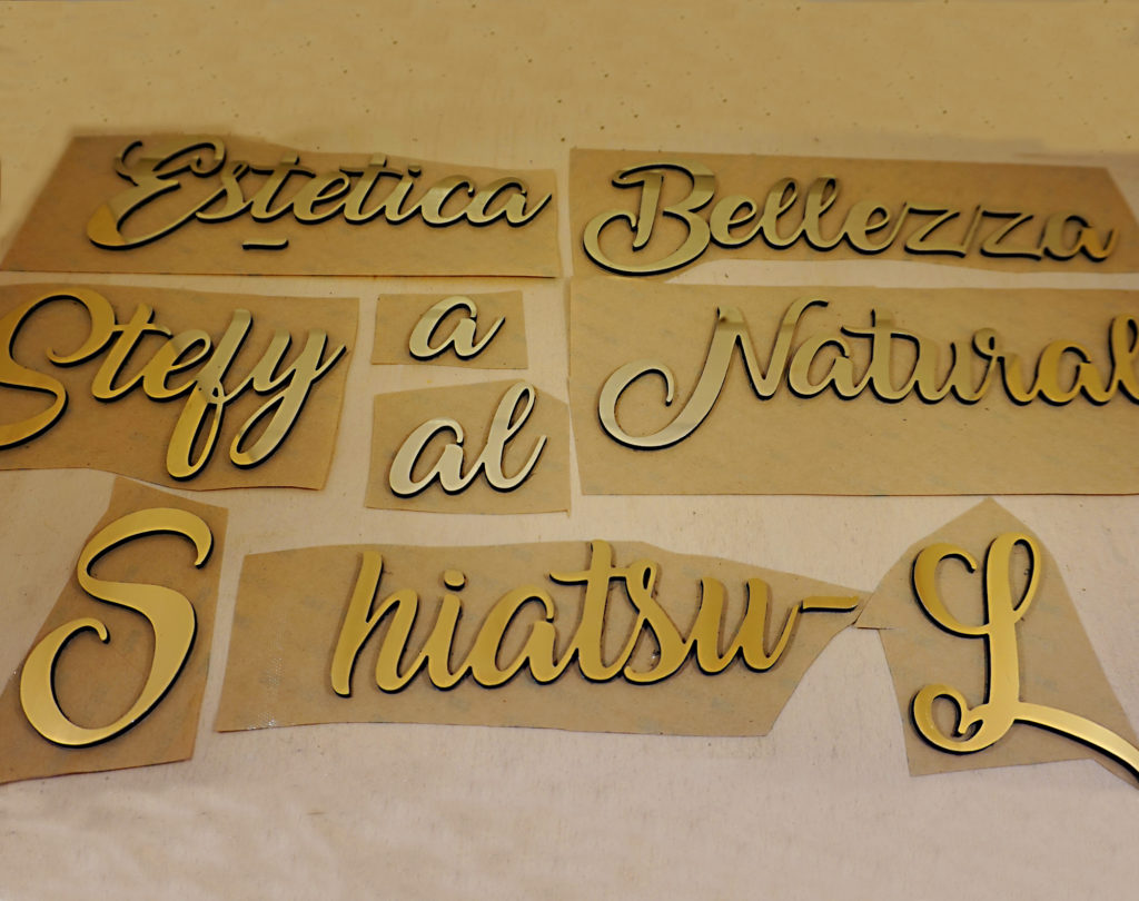 Personalized written in composite aluminum dibondo mirrored gold